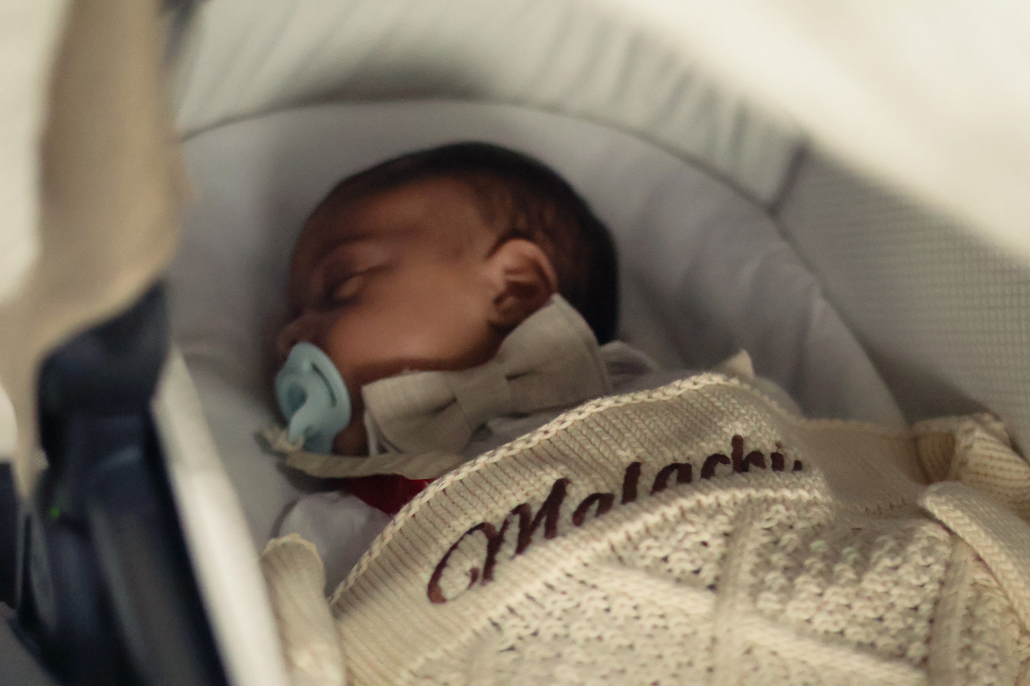 Sleeping baby before the christening celebration
